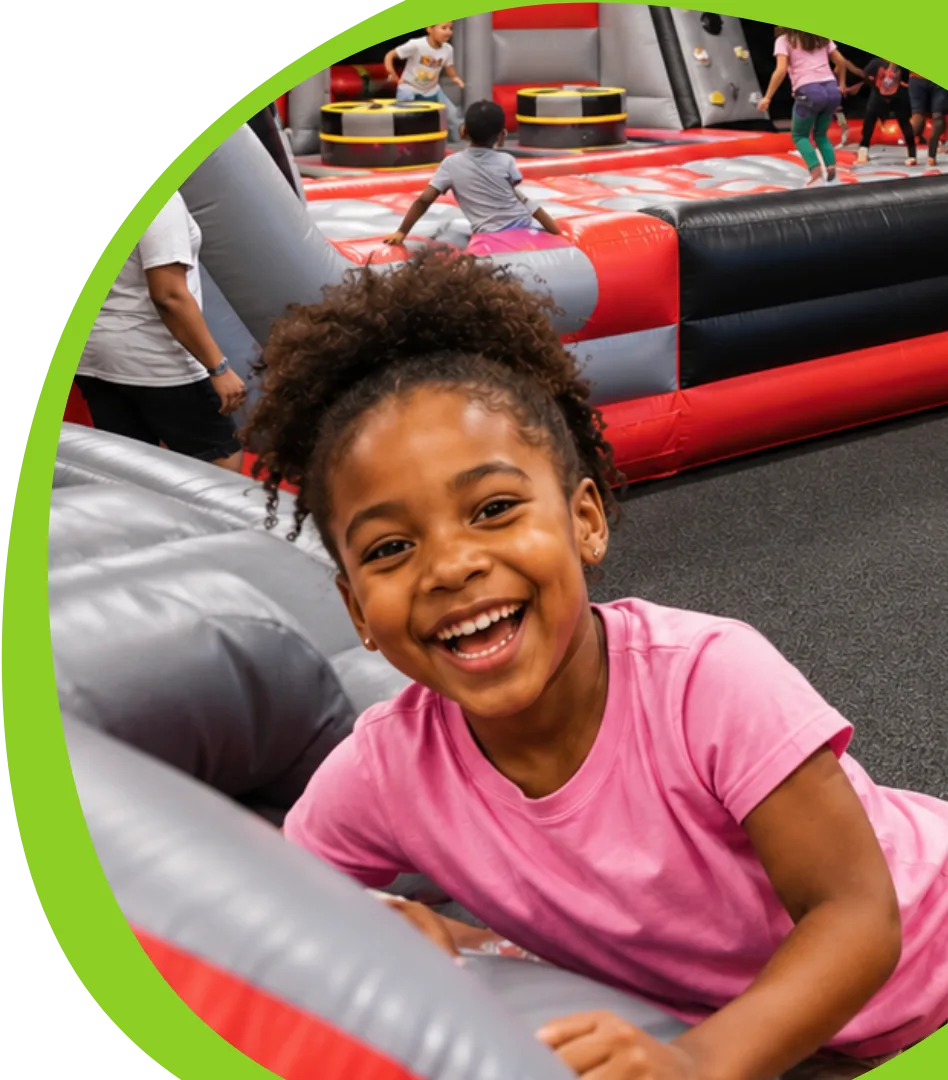 Happy child playing in the bounce zone